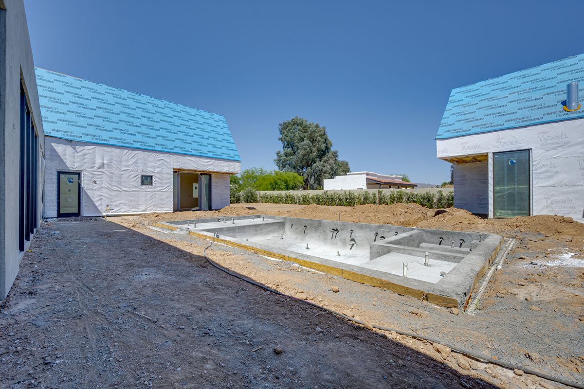Pool shell with steel and plumbing in a courtyard build, Phoenix metro