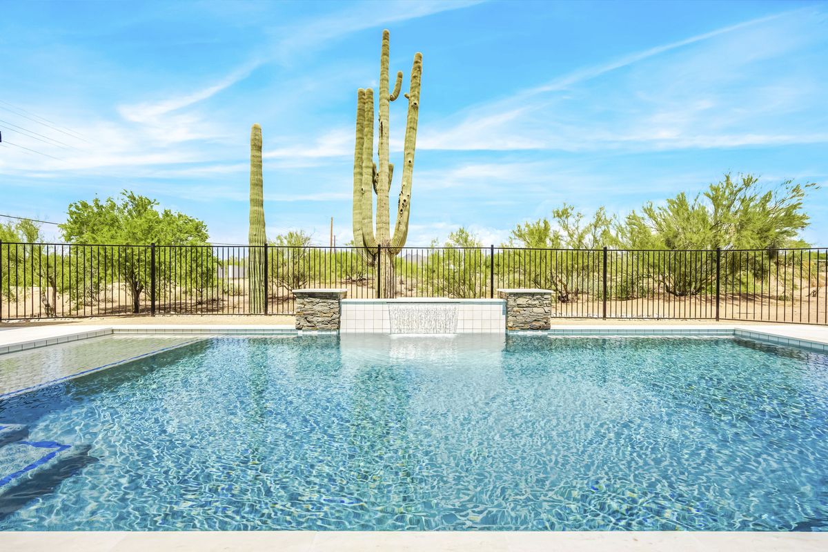 Completed pool with raised spa and cactus landscape, Cave Creek