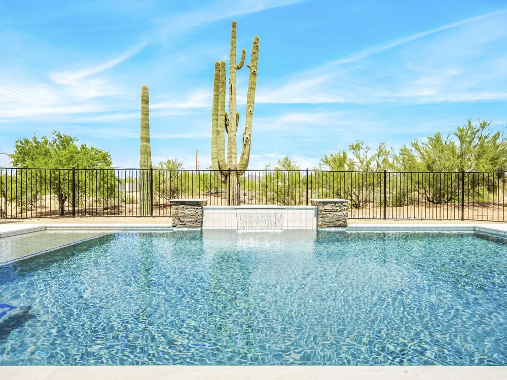 Completed rectangular pool with raised spa, Cave Creek