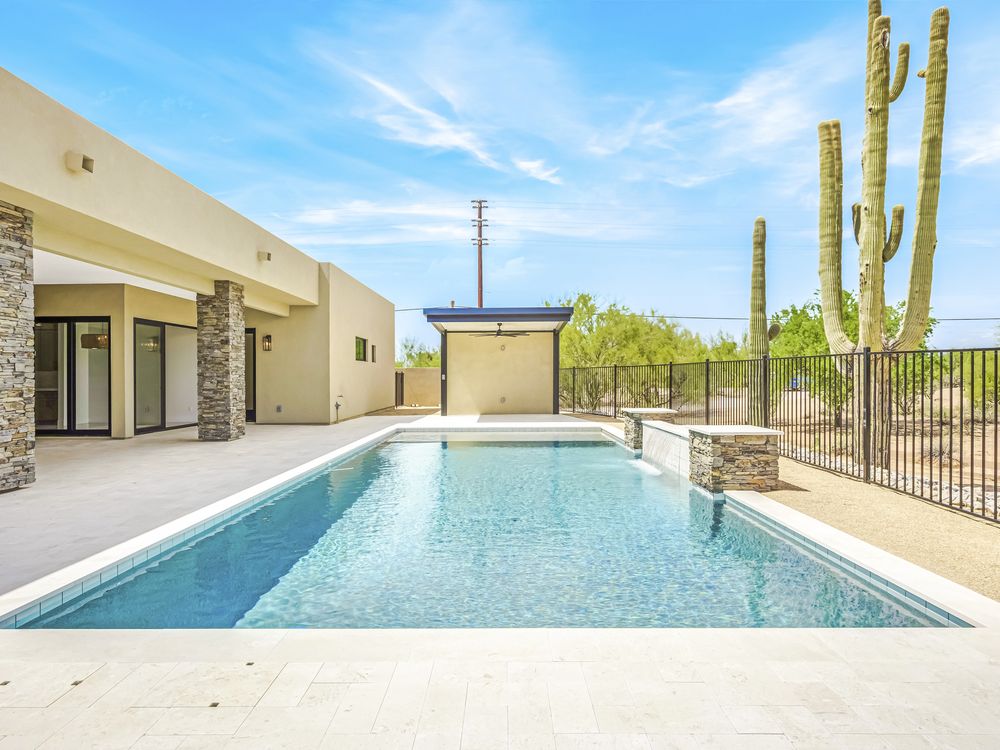 Completed pool and spa with block wall and cactus, Cave Creek